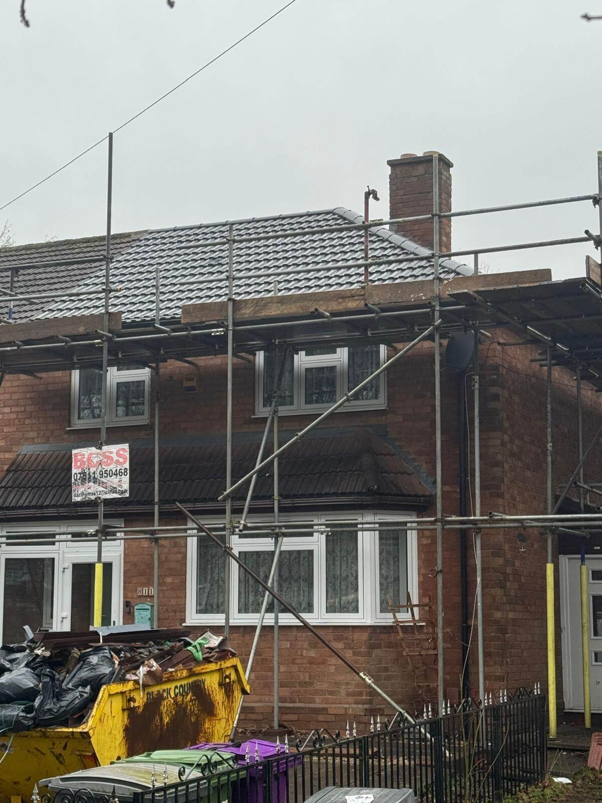 New_Tiled_Pitched_Roof_Scaffolding_Skip_Your_Space_Innovations_Roofing_&_Building_Services_Ltd Pitched roof work with scaffolding and a skip