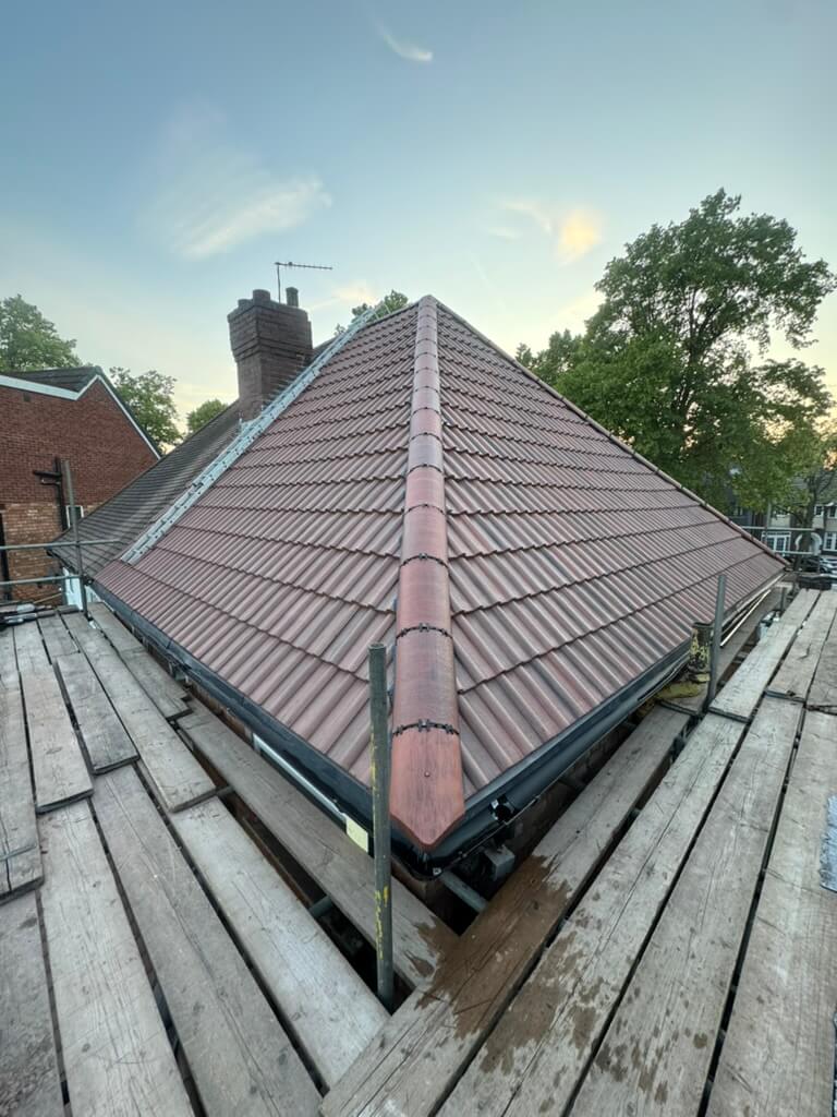 New_Tiled_Roof_Scaffolding_Your_Space_Innovations_Roofing_&_Building_Services_Ltd New tiled roof surrounded by scaffolding