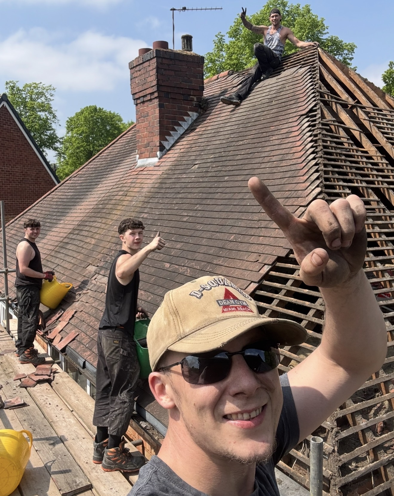 Your Space Innovations roofing team working together on a roof replacement project
