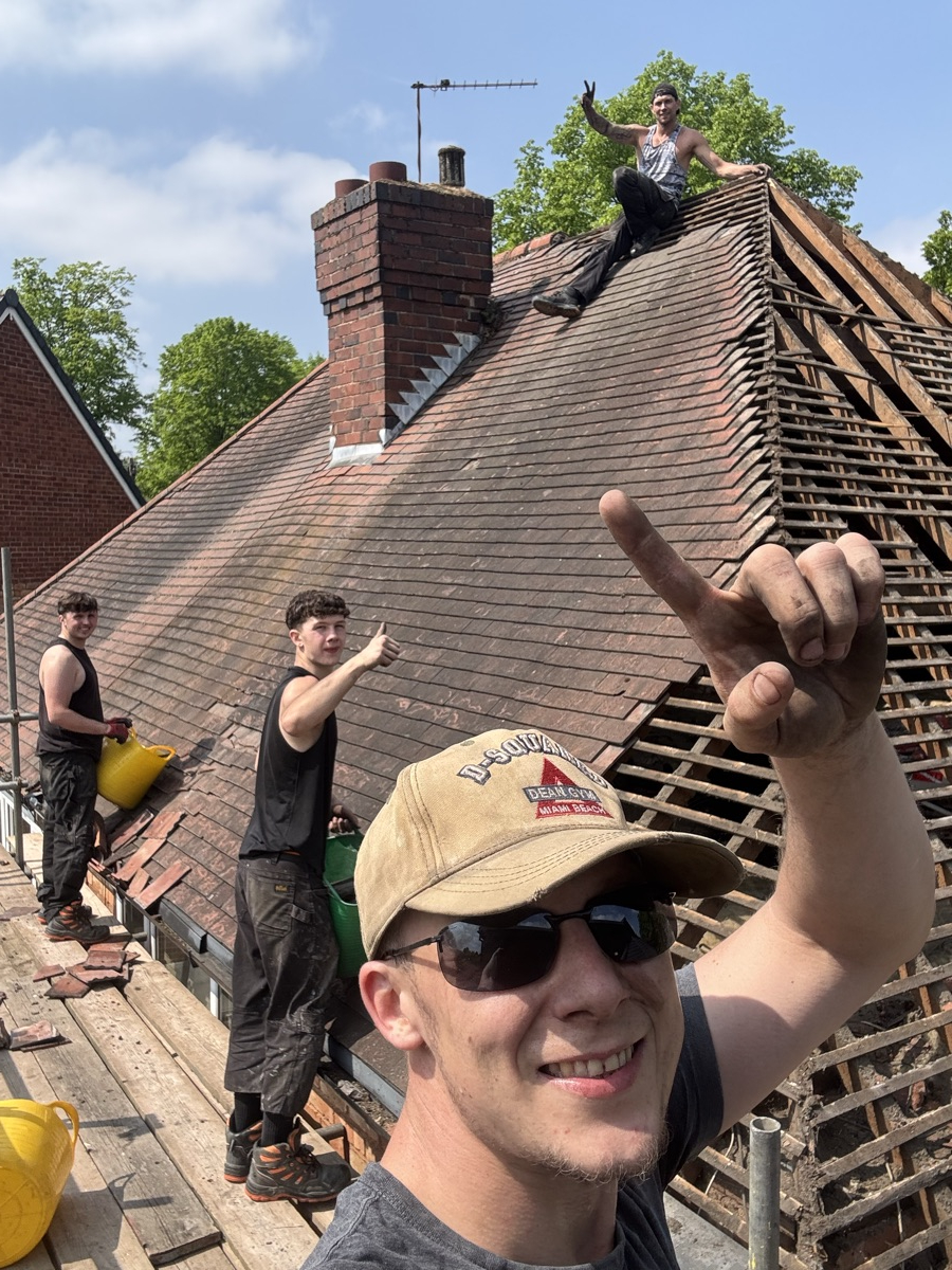 Your Space Innovations roofing team working on a tiled roof